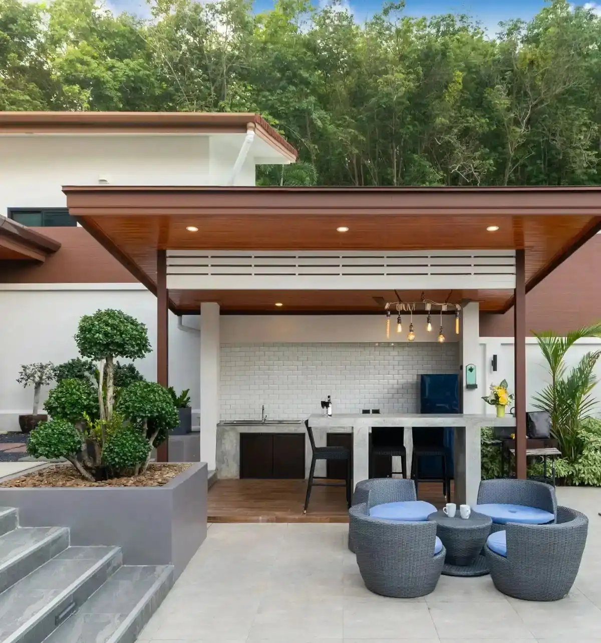 Modern Outdoor Kitchen with Bar Seating